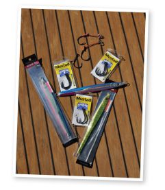 Knife or long jigs and hooks, some rigged assist style. 